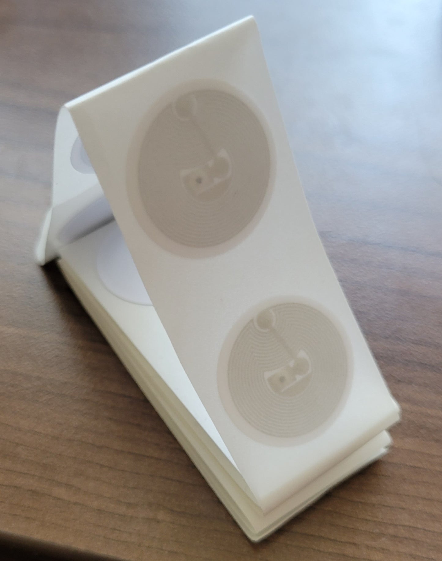 Tappable NFC stickers: Make any sign, card, or poster tappable! Custom NFC Tags with your Cicada link.